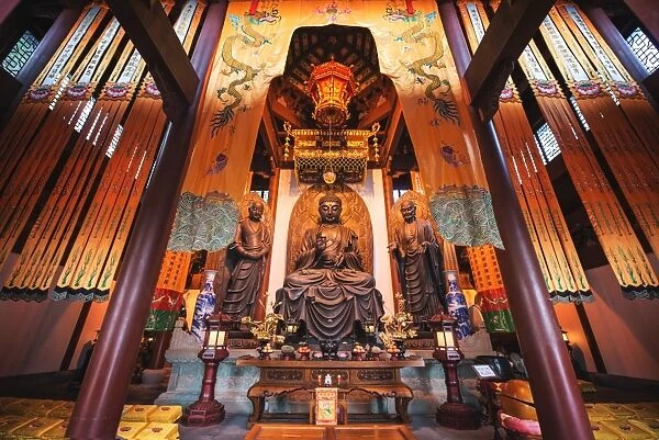 Interior architecture and Ru Lai Buddha statue at Lingyin Monastery in Hangzhou, Zhejiang, China, Asia