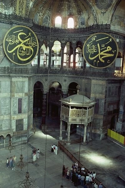 Interior with giant medallions inscribed with the different names of Allah