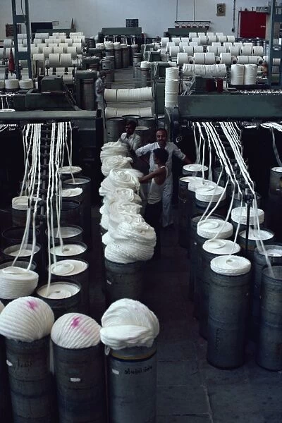 Interior of modernised cotton factory and workers