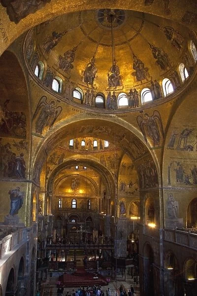 Interior of St. Marks Basilica (Basilica di San Marco) with golden Byzantine mosaics illuminated, Venice, UNESCO World Heritage Site, Veneto