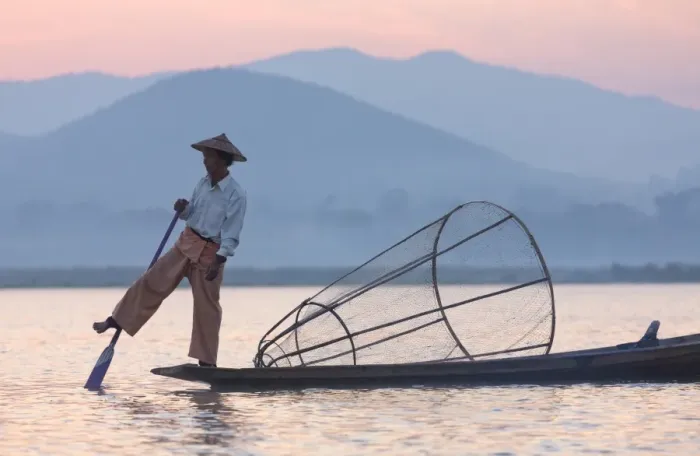 Framed Print : Intha leg rowing fishermen at dawn on Inle Lake who row traditional wooden boats using their leg and fish using nets stretched over conical bamboo frames, Inle Lake, Myanmar (Burma), Southeast Asia