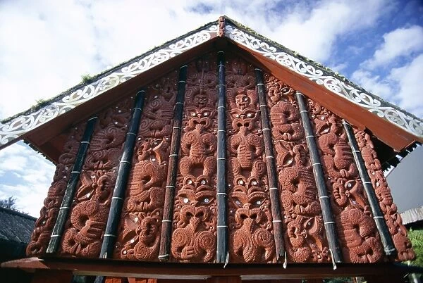Intricately carved storehouse in replica village at
