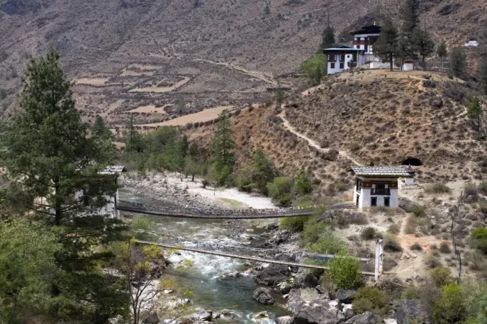 Framed Print : Iron bridge in valley, Bhutan, Asia Framed Print : Iron bridge in valley, Bhutan, Asia