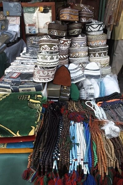 Islamic items including prayer mats and Muslim caps on sale at the market in the European Quarter of Djibouti City