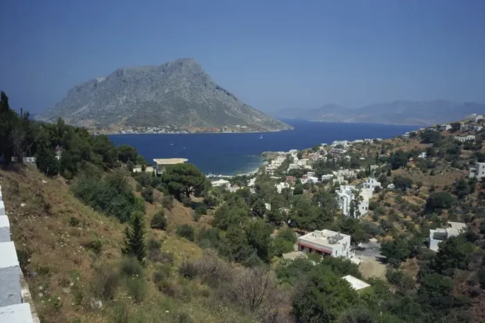 Framed Print : The island of Telendos in Panormos Bay on the island of Kalymnos Framed Print : The island of Telendos in Panormos Bay on the island of Kalymnos