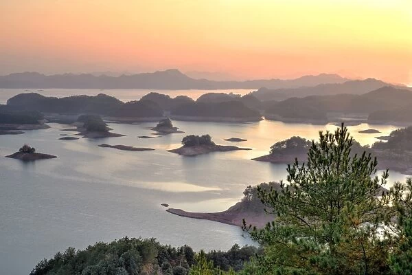 Islands at sunset at Qiandaohu, 1000 Islands Lake, Lijiang, Yunnan, China, Asia