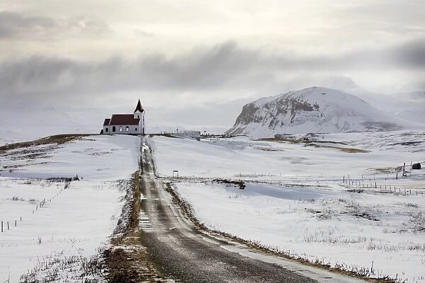 Isolated church (Ingjaldscholskirkja) in winter near Rif on the Snaefellsnes Peninsula
