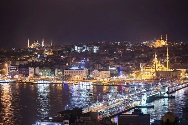 Istanbul at night, with Blue Mosque on left, New Mosque on right and Galata Bridge