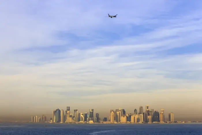 Framed Print : Jet airplane after take off from Hamad International Airport, seen above Doha city Framed Print : Jet airplane after take off from Hamad International Airport, seen above Doha city