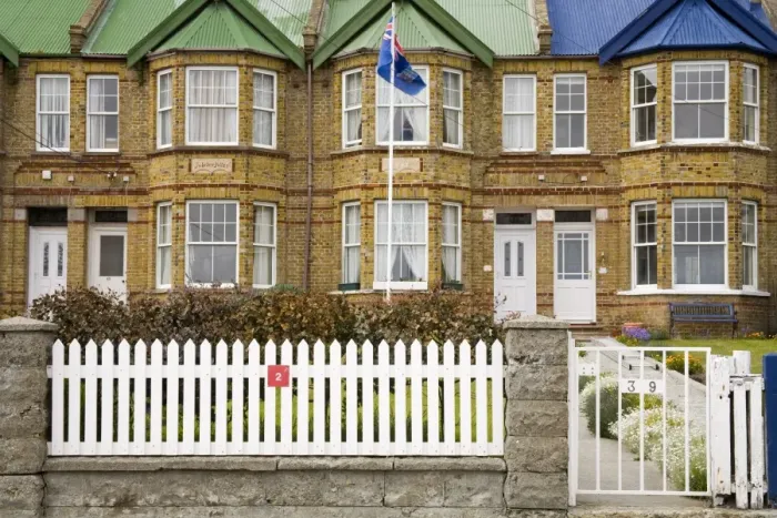 Framed Print : Jubilee Villas on the waterfront in Port Stanley, Falkland Islands, South America Framed Print : Jubilee Villas on the waterfront in Port Stanley, Falkland Islands, South America
