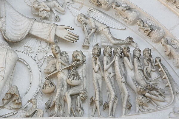 Detail of the Last Judgment depicted on the tympanum of the Vezelay Basilica