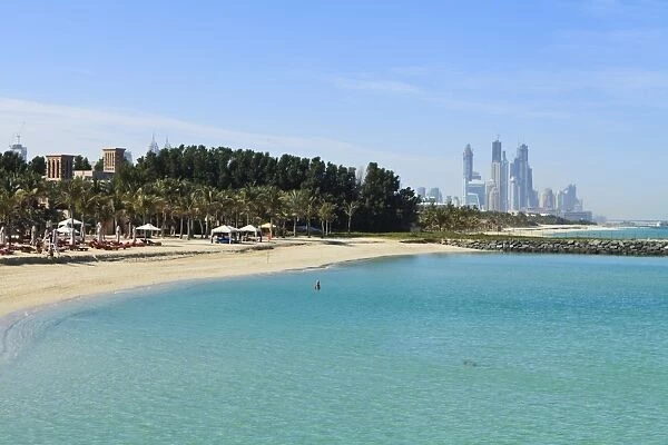 Jumeirah Beach looking towards the tall buildings of Dubai Marina, Dubai