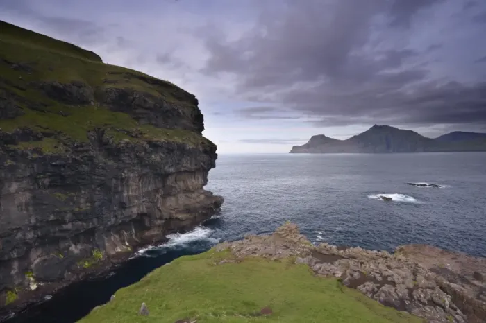 Framed Print : Kalsoy island and cliffs across Djupini sound, from Gjogv, Eysturoy, Faroe Islands Framed Print : Kalsoy island and cliffs across Djupini sound, from Gjogv, Eysturoy, Faroe Islands