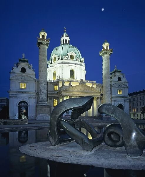 Karlskirche at night with Henry Moore sculpture in foreground, Vienna, Austria, Europe