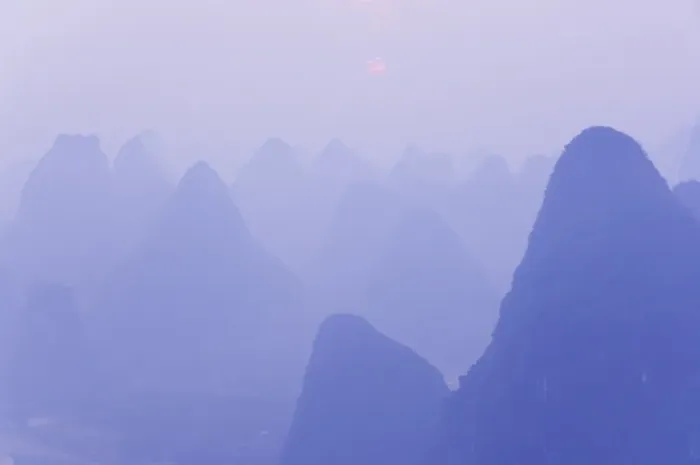 Framed Print : Karst landscape, haze and rising sun, Yangshuo, Guangxi Province, China, Asia Framed Print : Karst landscape, haze and rising sun, Yangshuo, Guangxi Province, China, Asia