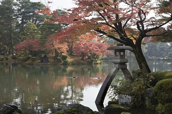 Kenrokuen Garden with Kotojitoro lantern in autumn, Kanazawa, Ishikawa Prefecture