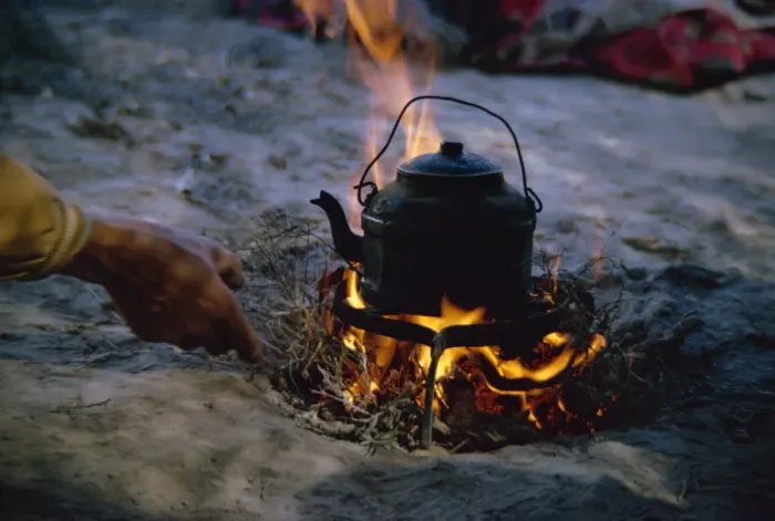 Framed Print : Kettle on fire in Qashqai camp