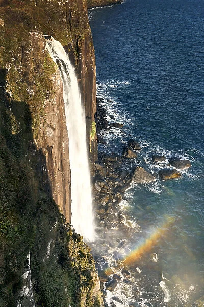 Kilt waterfall falling directly into the sea on the Isle of Skye, Inner Hebrides