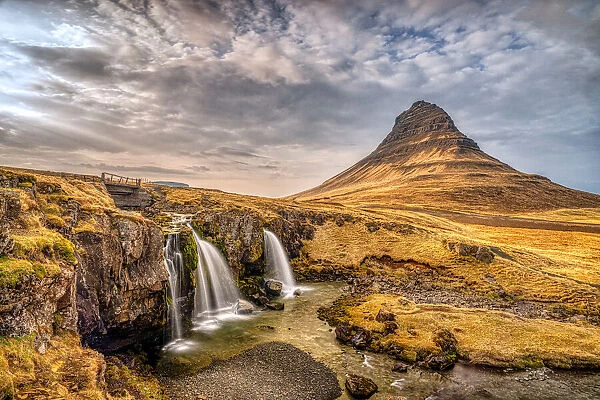 The Kirkjufell waterfall at sunrise, Snaefellsnes Peninsula, Western Iceland, Polar Regions