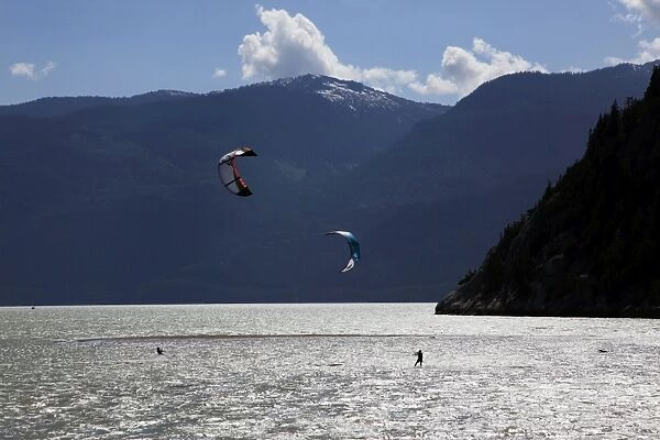 Two kite surfers on Howe Sound at Squamish, British Columbia, Canada, North America