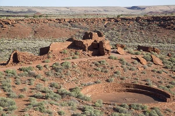 Kiva in foreground, Wupatki Pueblo, inhabited from approximately 1100 AD to 1250 AD