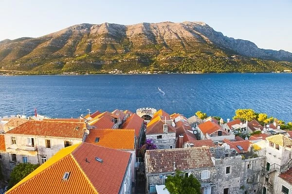 Korcula Town at sunset, elevated view from St. Marks Cathedral bell tower, Korcula Island, Dalmatian Coast, Adriatic, Croatia, Europe