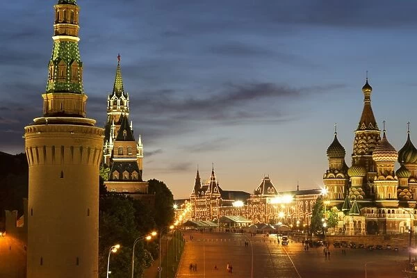 The Kremlin, Gum department store and the onion domes of St. Basils Cathedral in Red Square illuminated at night, UNESCO World Heritage Site, Moscow, Russia, Europe