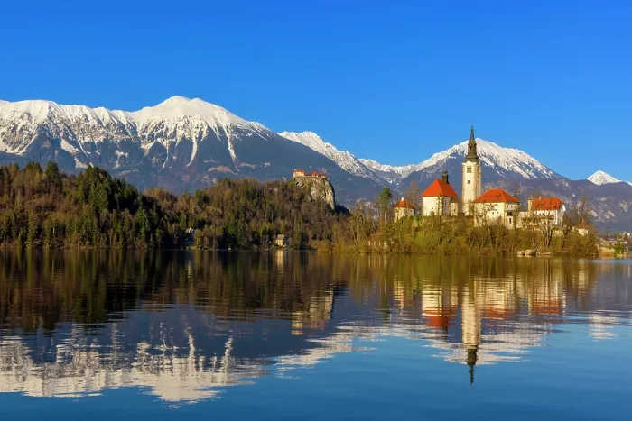 Framed Print : Lake Bled, Bled Castle and Bled Island with Snow Capped Julian Alps, Slovenia, Eastern Europe Framed Print : Lake Bled, Bled Castle and Bled Island with Snow Capped Julian Alps, Slovenia, Eastern Europe