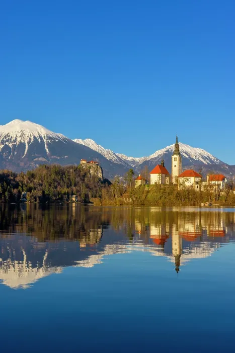 Framed Print : Lake Bled, Bled Castle and Bled Island with Snow Capped Julian Alps, Slovenia, Eastern Europe Framed Print : Lake Bled, Bled Castle and Bled Island with Snow Capped Julian Alps, Slovenia, Eastern Europe