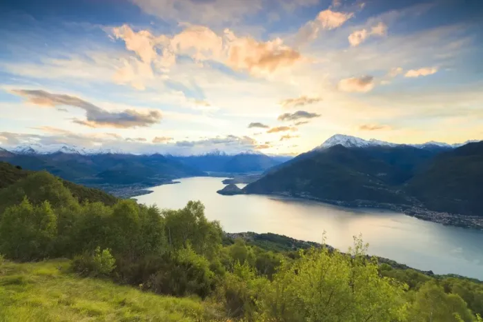 Framed Print : Lake Como surrounded by green meadows framed by pink sky at dawn, Cremia, San Domenico Framed Print : Lake Como surrounded by green meadows framed by pink sky at dawn, Cremia, San Domenico