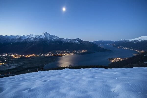 Lake Como and its many villages under a full moon, Lombardy, Italy, Europe