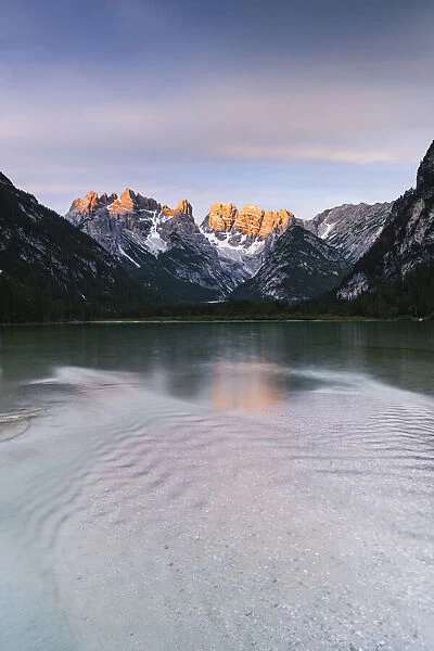 Lake Landro (Durrensee) at dawn with Popena group and Cristallo on background, Dolomites