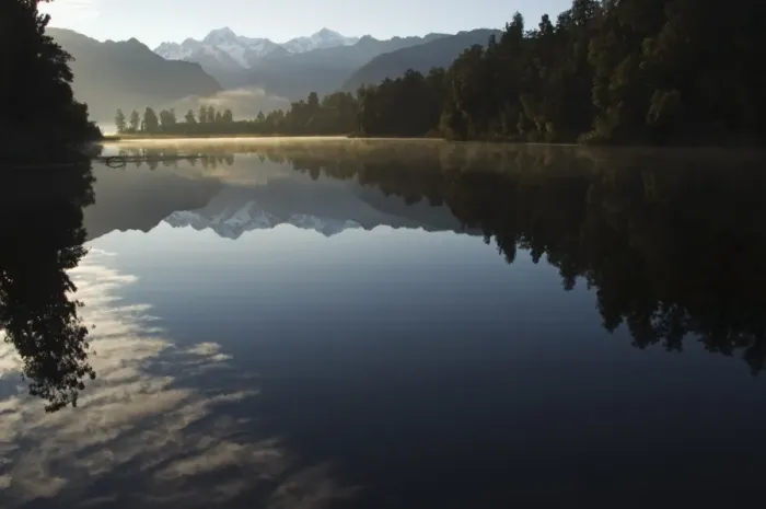 Framed Print : Lake Matheson in the evening reflecting a near perfect Framed Print : Lake Matheson in the evening reflecting a near perfect