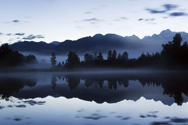 Lake Matheson at night reflecting a near perfect image