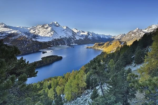 Lake Sils, between Maloja Pass and Lake Silvaplana, overlooked by several mountains over 3000 metres, Graubunden, Switzerland, Europe