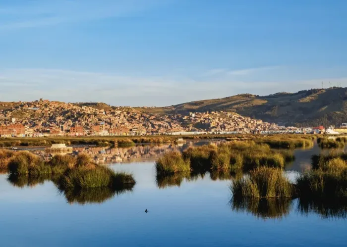 Framed Print : Lake Titicaca and cityscape of Puno at sunrise, Peru, South America Framed Print : Lake Titicaca and cityscape of Puno at sunrise, Peru, South America