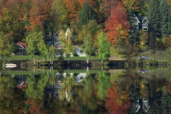 Lakeside houses and fall foliage