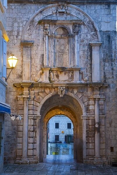 Land Gate illuminated at dusk, Stari Grad (Old Town), Korcula Town, Korcula, Dalmatia, Croatia, Europe