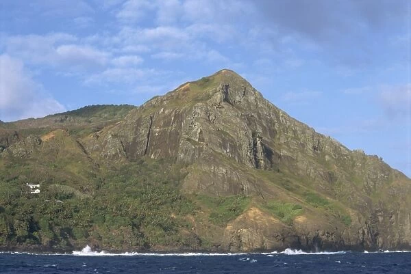 Landscape of coastline and rocky hills of Pitcairn Island