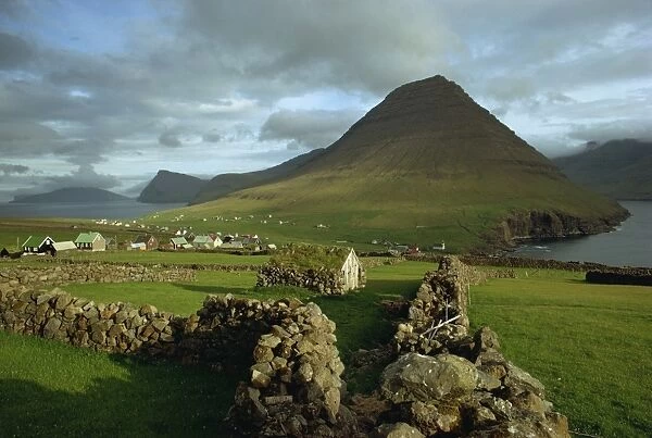 Landscape containing dry stone walls and a small settlement, Faroe Islands