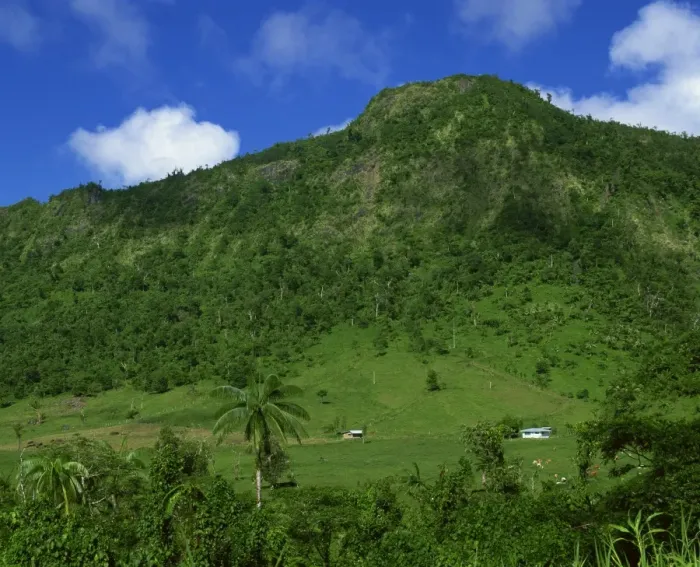 Framed Print : Landscape of lush vegetation and small houses in the interior of the island near Le Mafa Pass Framed Print : Landscape of lush vegetation and small houses in the interior of the island near Le Mafa Pass