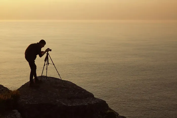 Framed Print : A landscape photographer at work, on the Bristol Channel coast at the Valley of Rocks, near Lynton, Exmoor National Park, Devon, England, United Kingdom, Europe Framed Print : A landscape photographer at work, on the Bristol Channel coast at the Valley of Rocks, near Lynton, Exmoor National Park, Devon, England, United Kingdom, Europe
