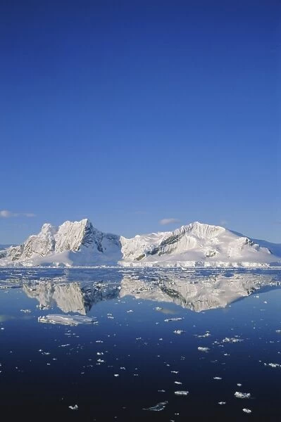 Landscape reflected in water, Antarctic Peninsula, Antarctica