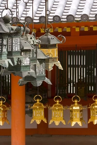 Detail of lanterns hanging outside Kasuga Taisha temple in Nara Koen