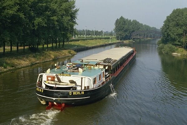 Large barge on canal in northern Germany