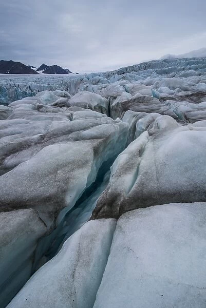 Large ice crack in a huge glacier in Hornsund, Svalbard, Arctic