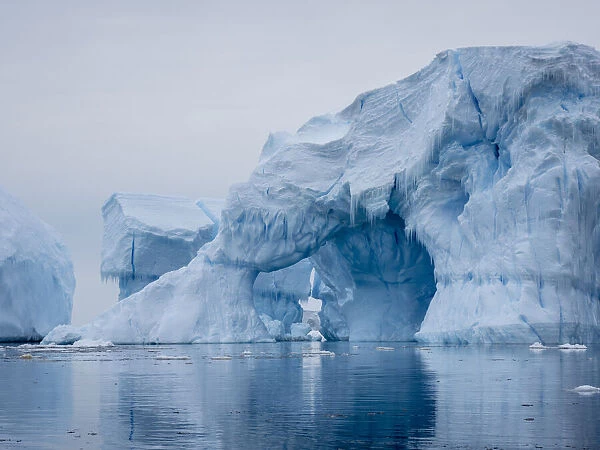 Large iceberg grounded on a reef at Peter I Island, Bellingshausen Sea, Antarctica, Polar Regions
