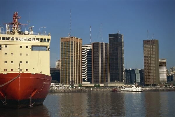 Large ship in harbour and dockside skyscrapers, Buenos Aires, Argentina, South America