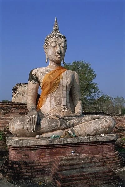 Large statue of the seated Buddha outdoors