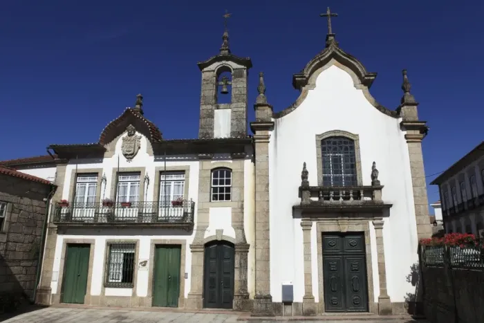 Framed Print : The late 18th century Pombaline-style Pacos do Concelho prison, court and church building at Ponte da Barca, Minho